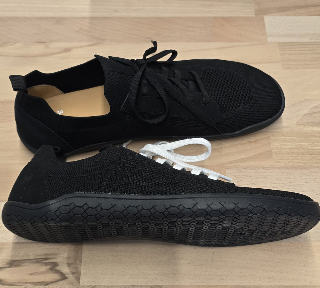 Men's Vector Barefoot Black shoes by Loungers, bottom view showing flexible sole and sleek design for barefoot feel.