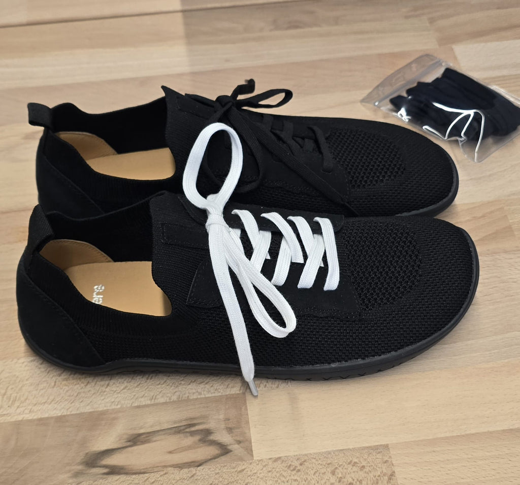Men's black Vector Barefoot shoes by LOUNGERS, side view showing minimalist design and flexible sole.