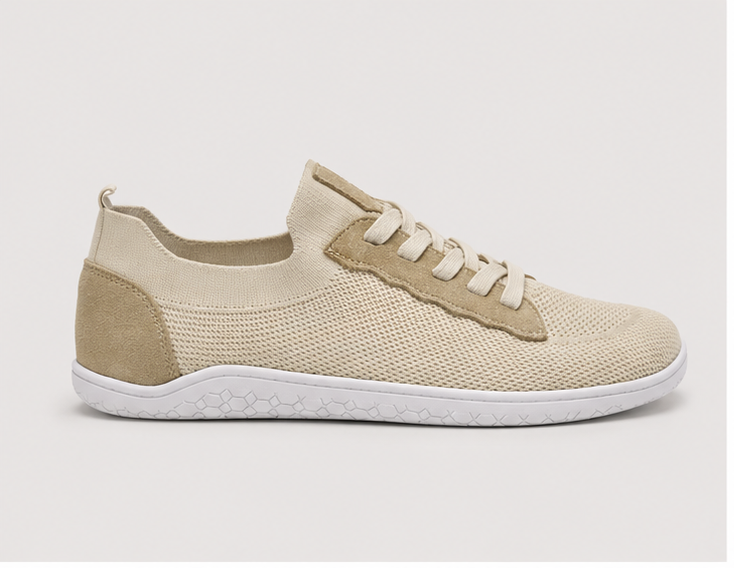 Men's beige barefoot shoes by LOUNGERS, side view of the Vector model showing lightweight design and natural fit.