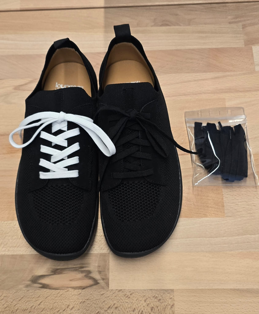 Men's Vector Barefoot Black shoes by LOUNGERS, top view showing sleek minimalist design and flexible barefoot-style sole.